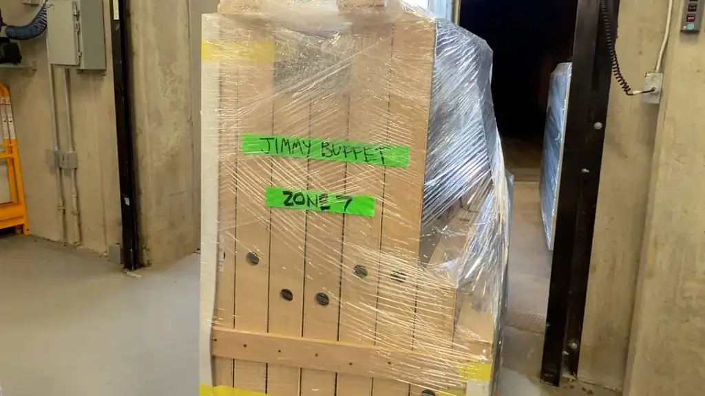 exhibit being loaded into museum
