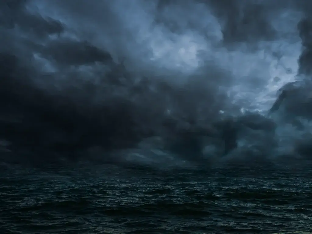 dark stormy clouds over ocean